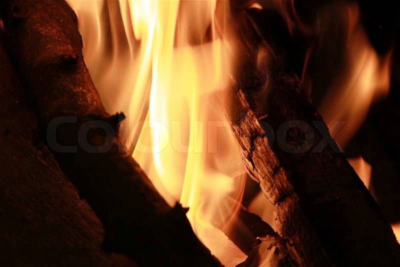 Fire in the fireplace always makes good pictures, stock photo
