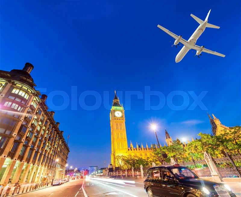 Airplane landing in London, UK. Tourism concept, stock photo