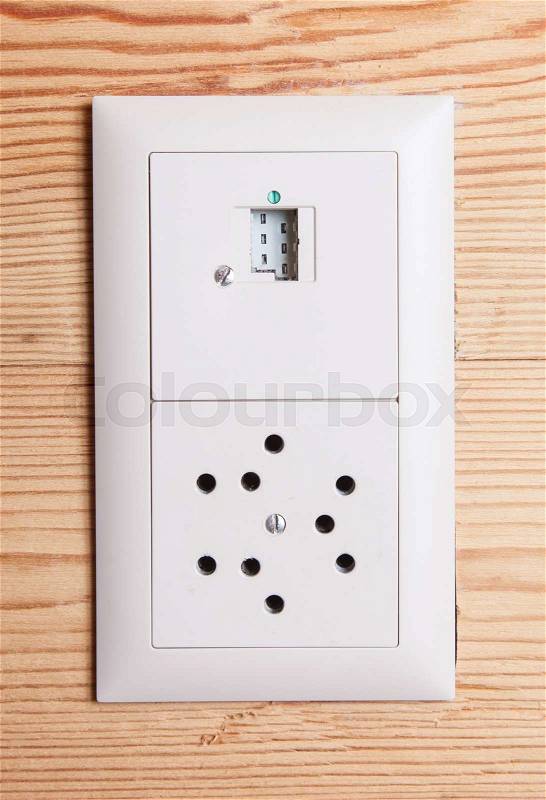 International AC power plug wall socket - Switzerland, stock photo
