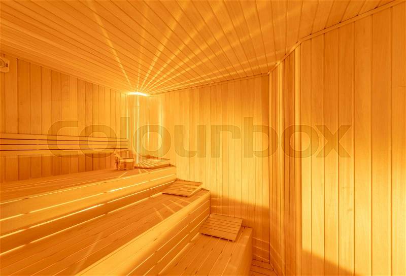 Hot wooden sauna room interior, stock photo