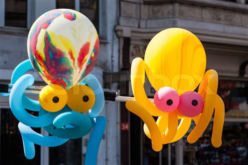 Colorful balloon animals in the city, stock photo