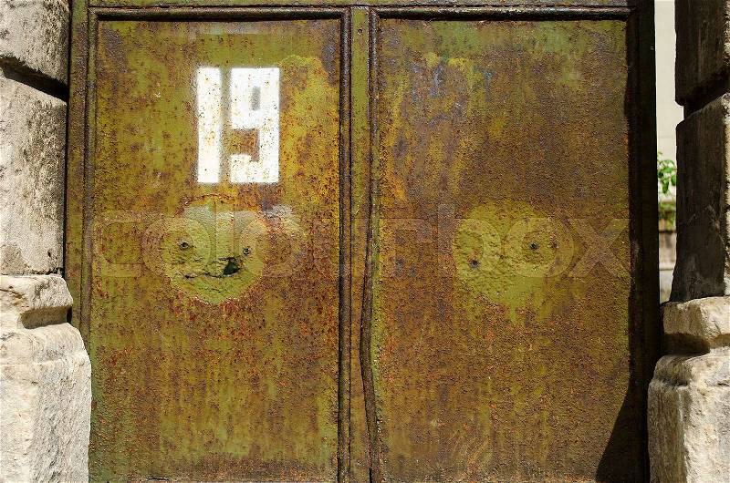 Old weathered wooden garage door, stock photo