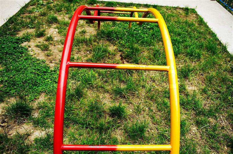 Childrens climbing frame in seaside town very colourful framework, stock photo