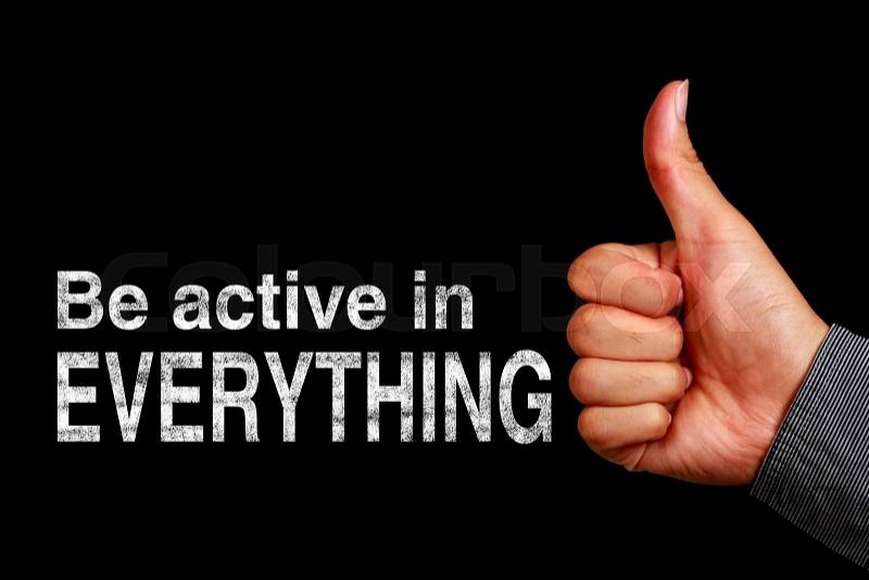 Text Be Active in Everything is written on the blackboard with thumb up hand aside, stock photo