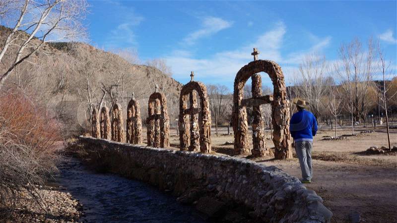 The El Santuario de Chimayo in northern New Mexico is said to contain \