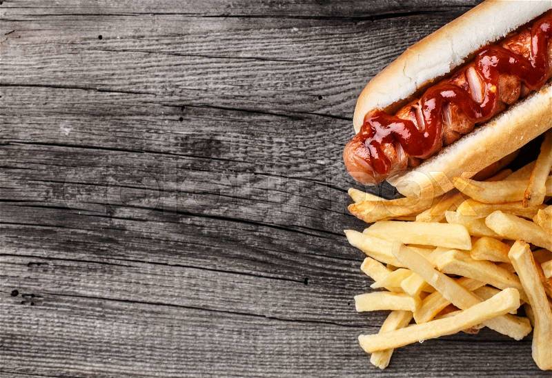 Barbecue grilled hot dog with french fries, stock photo