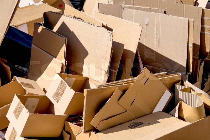 Cartons waiting to be picked up by the garbage trucks. recycling of waste paper, stock photo