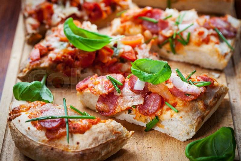 Pull aparat pizza breadwith herbs and basill, stock photo