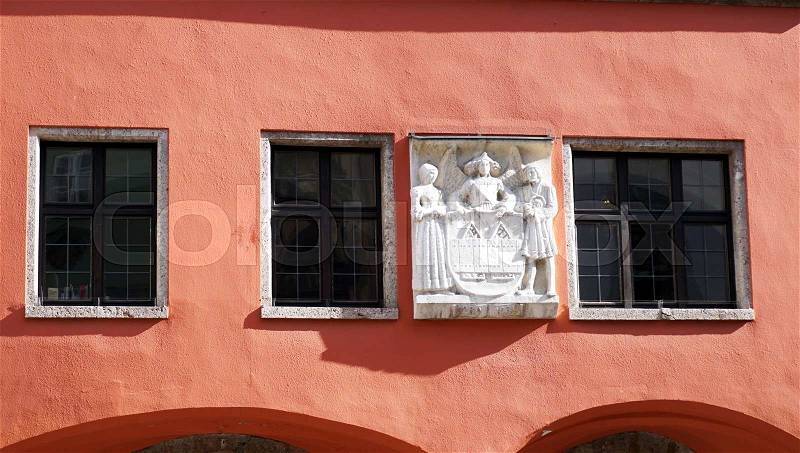 Old rose color facade and sculpture in old town Innsbruck, stock photo