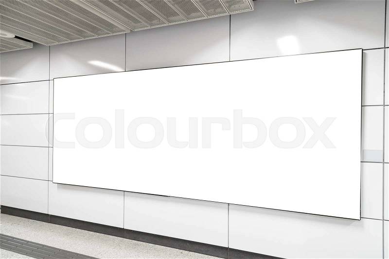 One big horizontal / landscape orientation blank billboard in public transport, stock photo