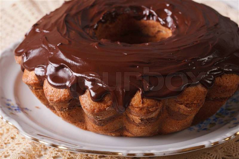 Homemade chocolate cake fancy bread on a plate closeup. Horizontal , stock photo
