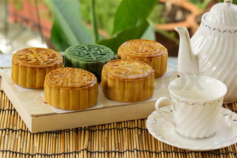 Moon cake on the tray Jug of tea / Autumn festival foods, stock photo