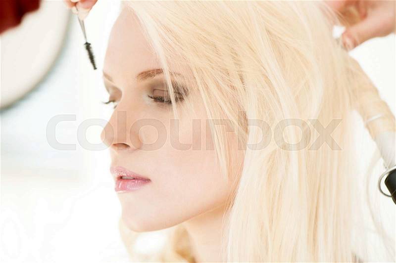 Portrait of beautiful blond woman with natural makeup posing on studio background.Perfect clean skin, stock photo