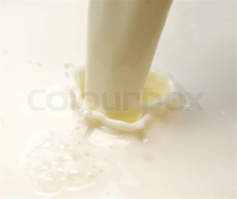 Fresh milk pouring, stock photo