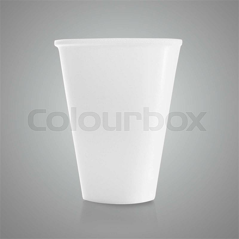 Plastic cup on gray background, stock photo