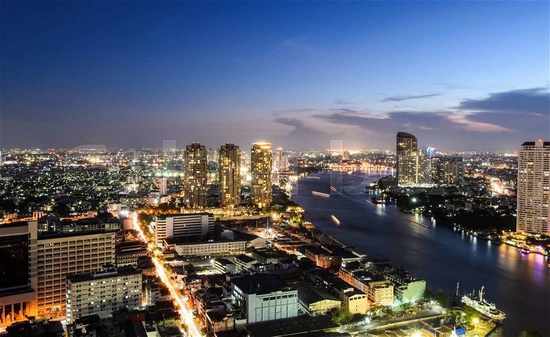 Landscape of River in Bangkok city in night time with bird view, stock photo