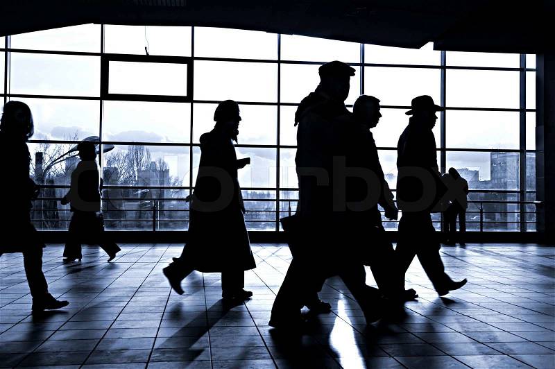 City people walking in a futuristic tunnel, stock photo