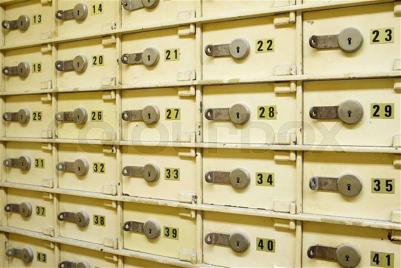 Closeup of a group of cells in an old safe bank, stock photo