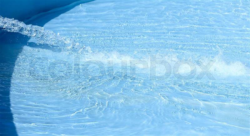 Fill the small swimming pool with clean water, stock photo