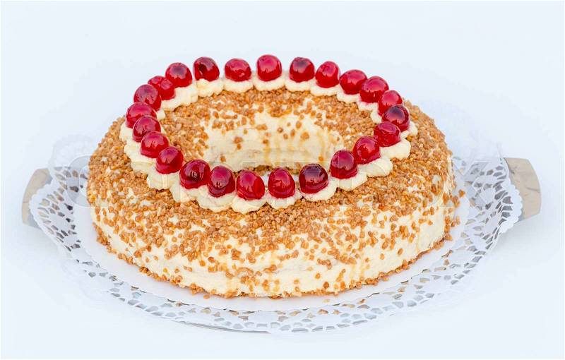Frankfurt crown cake with cherries on white background, stock photo