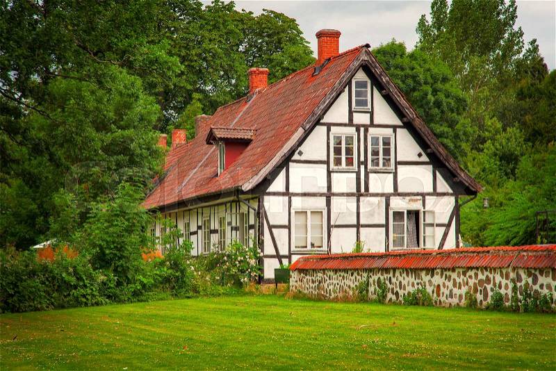 Image of an old timber-frame building, European style. Ortofta, Sweden. , stock photo