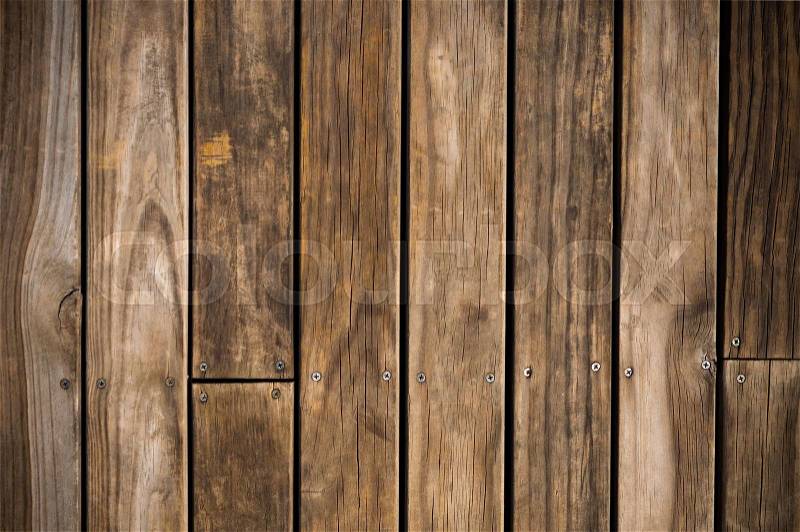 Dark brown wood plank with screw background, stock photo
