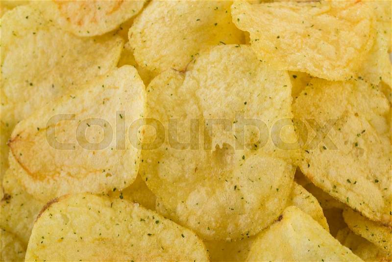 Prepared potato chips snack closeup viewas a background, stock photo