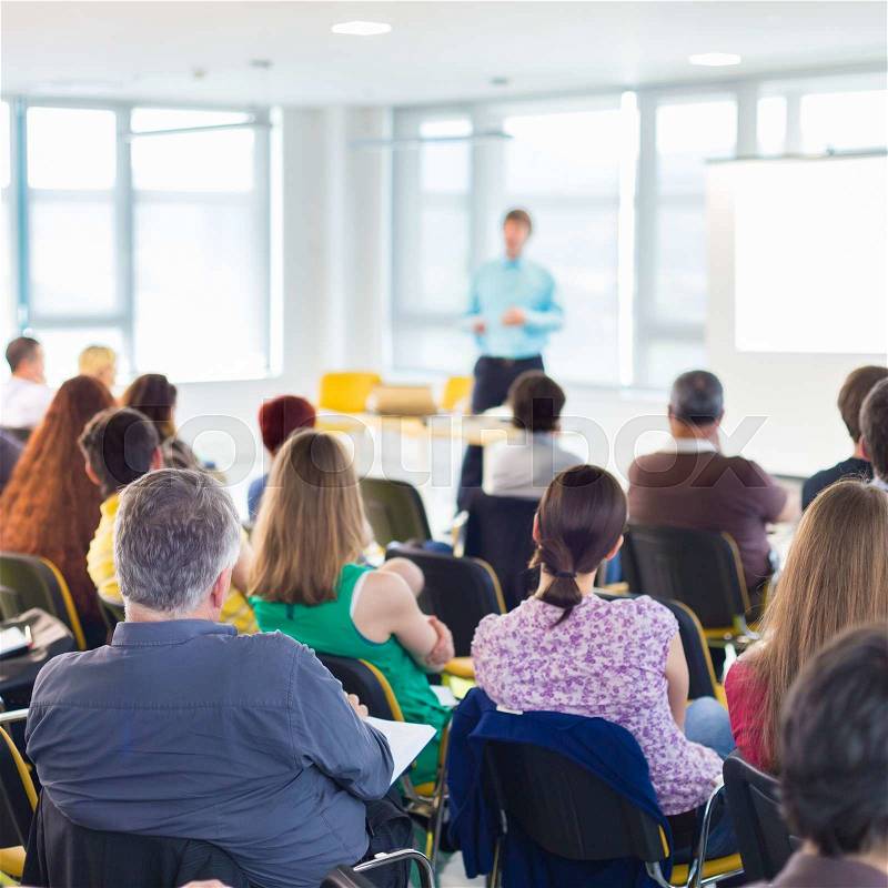 Speakers Giving a Talk at Business Meeting. Audience in the conference hall. Business and Entrepreneurship concept, stock photo