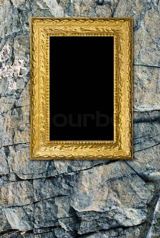 Stone background with vintage gold frame, stock photo