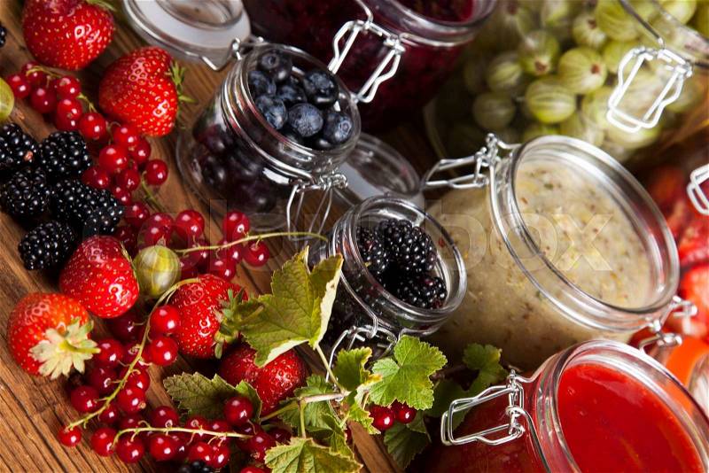 Fresh berries and wild berry jam, stock photo