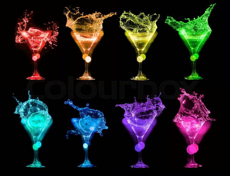 Set of colorful Bright cocktails in glasses on black background, stock photo