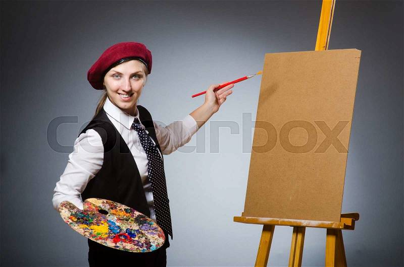 Funny artist working in the studio, stock photo