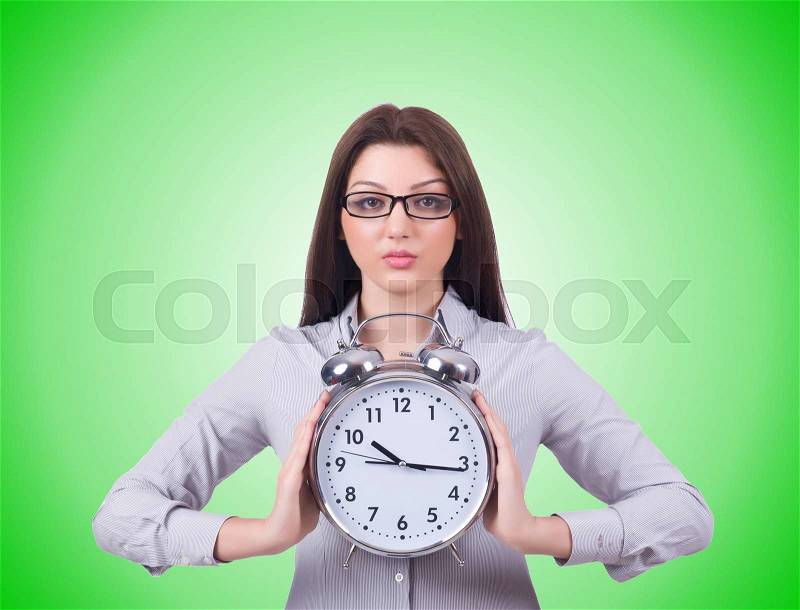 Woman with clock isolated on white, stock photo