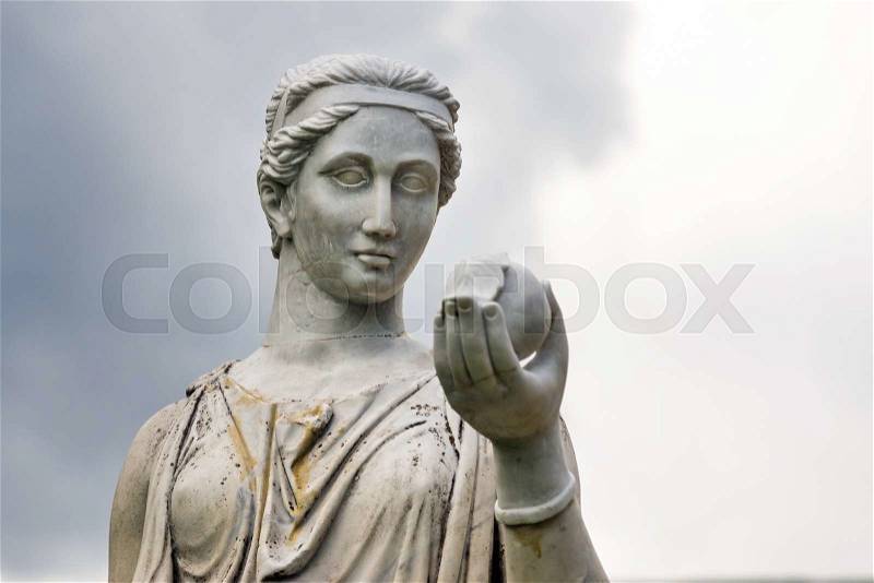 Marble statue of the Greek goddess Hera or the Roman goddess Juno, holding an apple of discord in the park of the Palace and park complex Estate of G. Galagan. Sokyryntsi village, Ukraine, stock photo