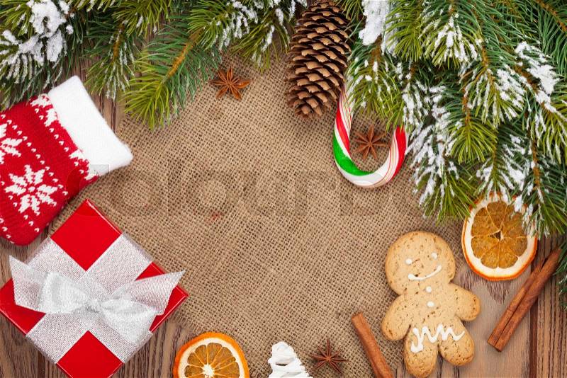 Christmas food, decor and gift box with snow fir tree background with copy space, stock photo