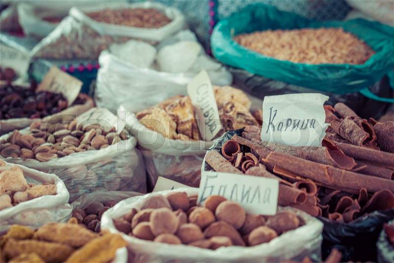 Beautiful vivid oriental market with bags full of various spices in Osh Kyrgyzstan, stock photo