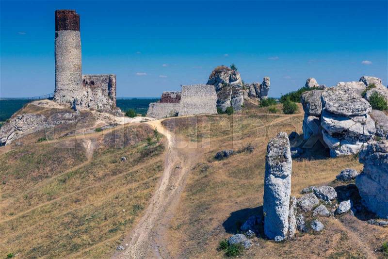 White rocks and ruined medieval castle in Olsztyn, Poland , stock photo