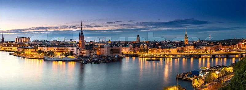 Scenic summer night panorama of the Old Town (Gamla Stan) architecture in Stockholm, Sweden, stock photo