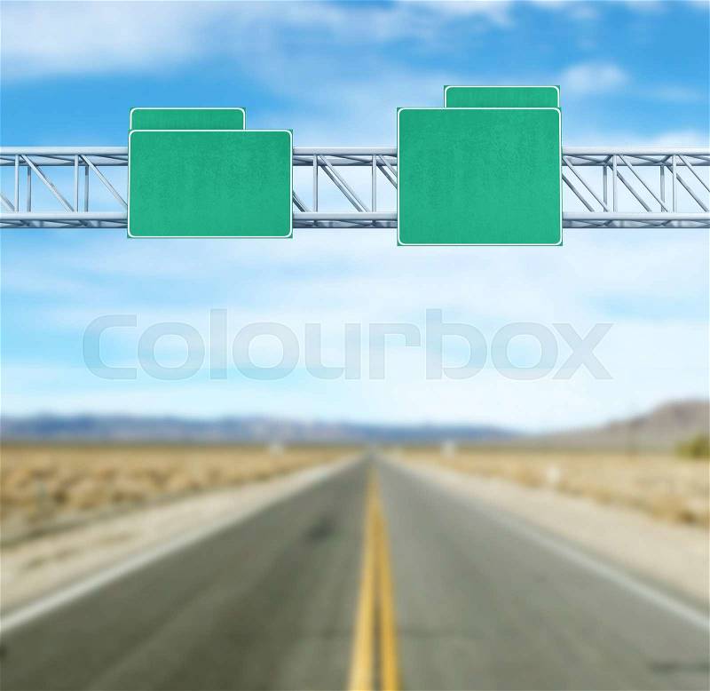 Pointer tracks, green road signs on the background of the road, stock photo