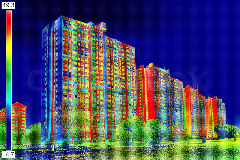 Infrared thermovision image showing lack of thermal insulation on Residential building , stock photo