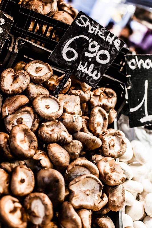 Heap of dried edible mushrooms on the market , stock photo