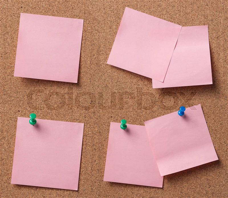 Note paper with push pins on cork board ready for your text, stock photo