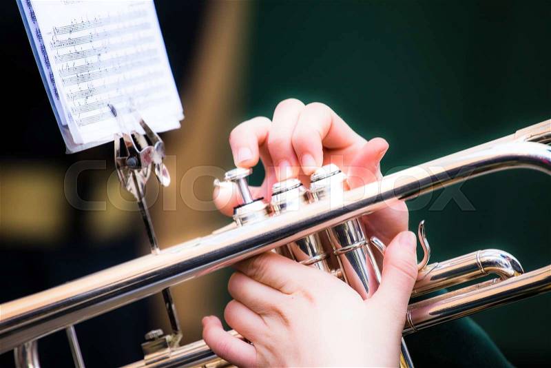Vintage trombones playing in a big band, stock photo