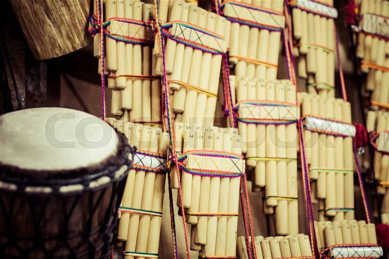 Authentic south american panflutes in local market in Peru, stock photo
