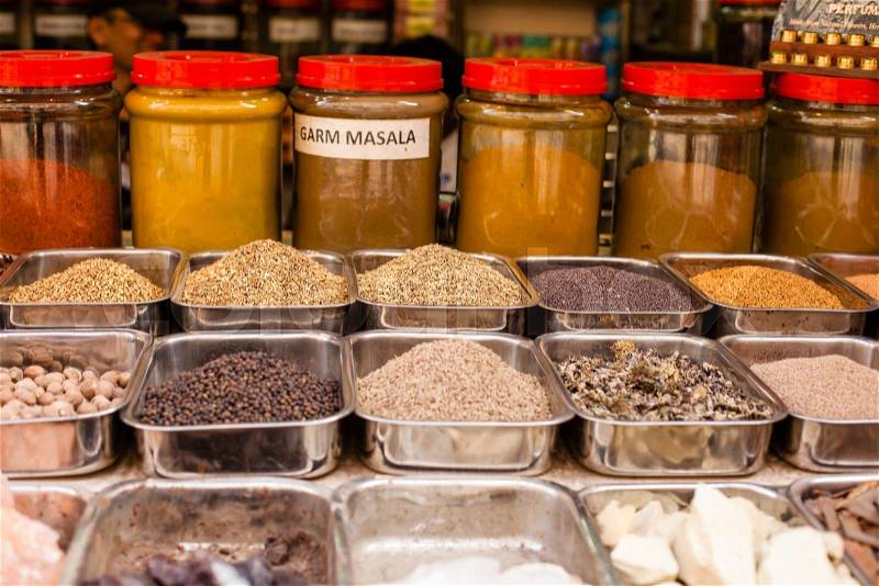 Jars of herbs and powders in a indian spice shop. , stock photo