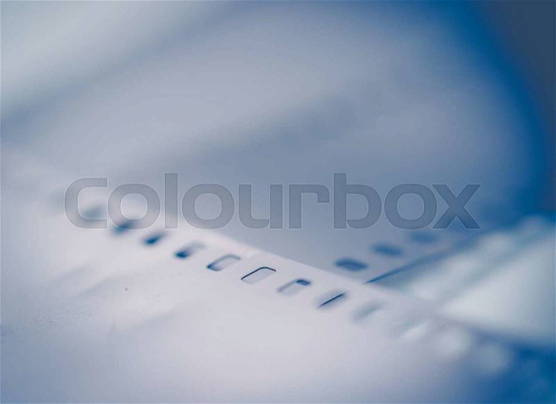 Close-up Film of a roll 35 mm photographic film; vintage tone style,soft focus, stock photo