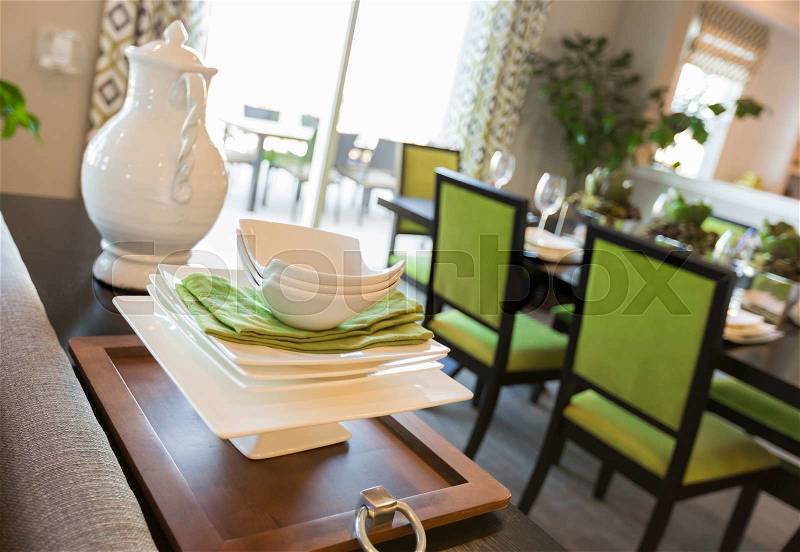 Beautiful Dining Area of Home with Apple Green Accents, stock photo
