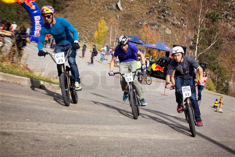 ALMATY, KAZAKHSTAN - OCT 10, 2015: E.Rogov (N33) and others in action at Red Bull Hill Chasers 2015, stock photo