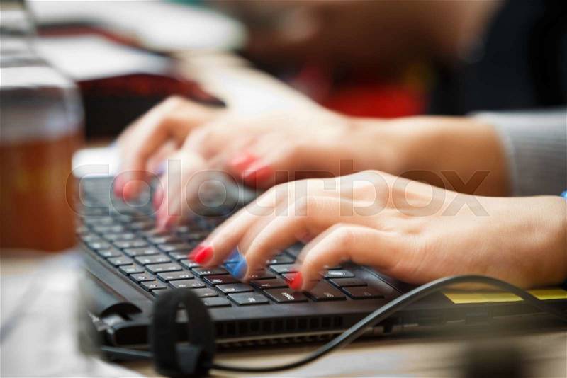 Close up movement of fingers typing on keyboard, business or communication concept, stock photo