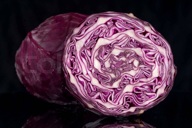 Red cabbage over black background, stock photo